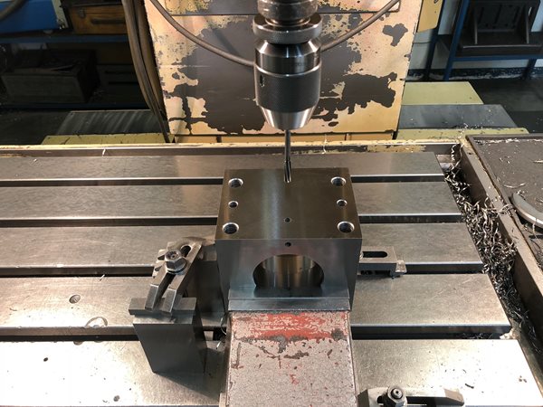 Precision drilling by jig boring machines